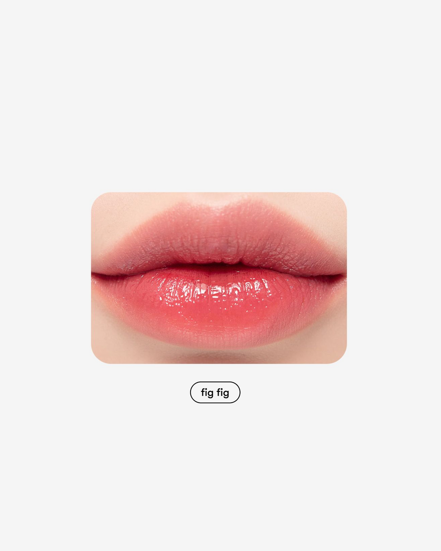 Tinta labial Juicy Lasting en tono Fig Fig Rom-nd en Momiji Beauty. Sumérgete en un mundo de color y durabilidad, te ofrece labios con una pigmentación intensa, acabado jugoso  y radiante durante horas. Su fórmula de larga duración se desliza suavemente sobre tus labios, proporcionando una cobertura uniforme y confortable sin retoques constantes. Enriquecida con ingredientes hidratantes, como la jugosa esencia de higo, esta tinta labial nutre y protege tus labios, manteniéndolos suaves y sedosos. 
